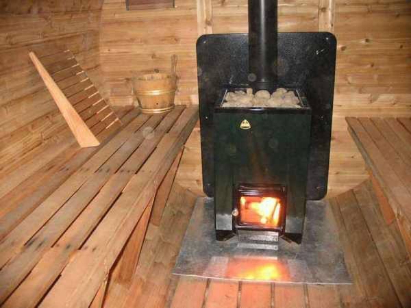 Как установить печь в бане на деревянный пол - фото